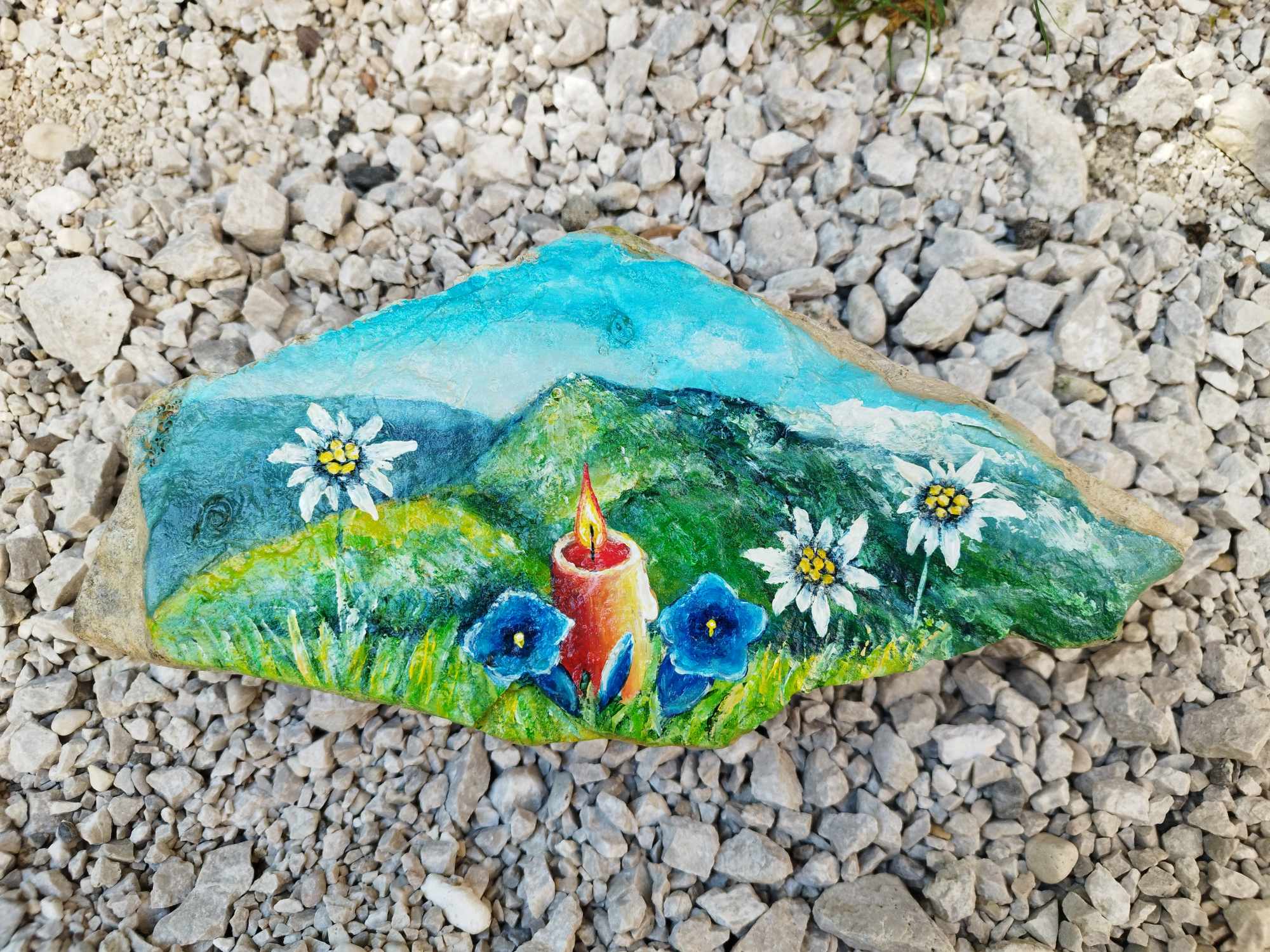 Črna prst, svečka na kamnu